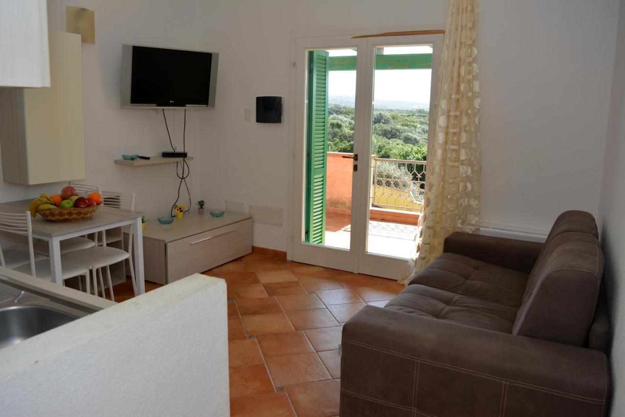 Appartamenti Residence Zodiaco Porto Pozzo Bagian luar foto