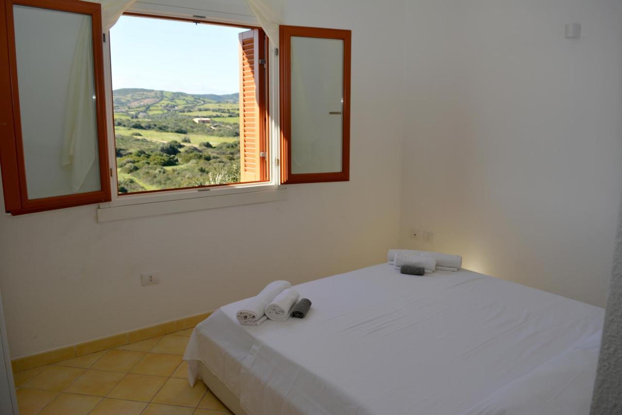 Appartamenti Residence Zodiaco Porto Pozzo Bagian luar foto