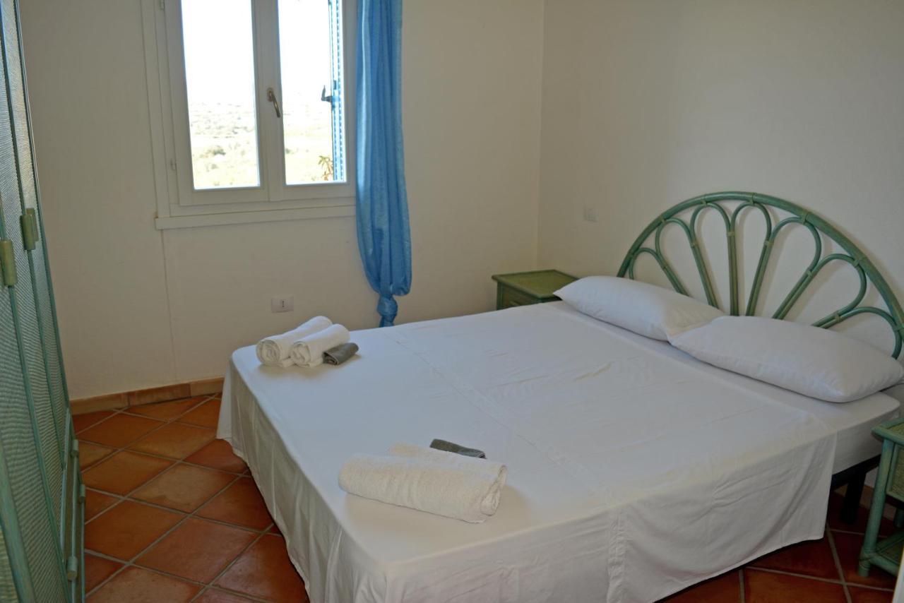 Appartamenti Residence Zodiaco Porto Pozzo Bagian luar foto