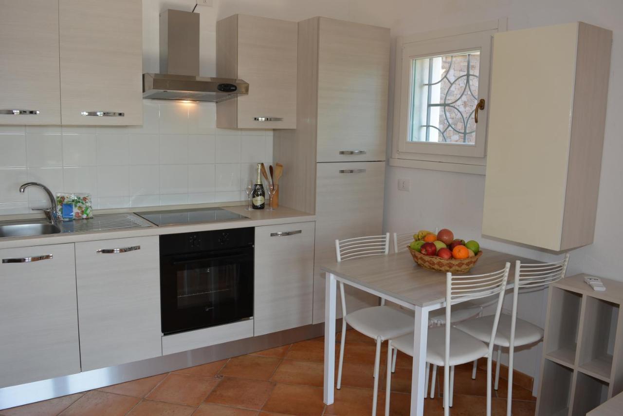 Appartamenti Residence Zodiaco Porto Pozzo Bagian luar foto