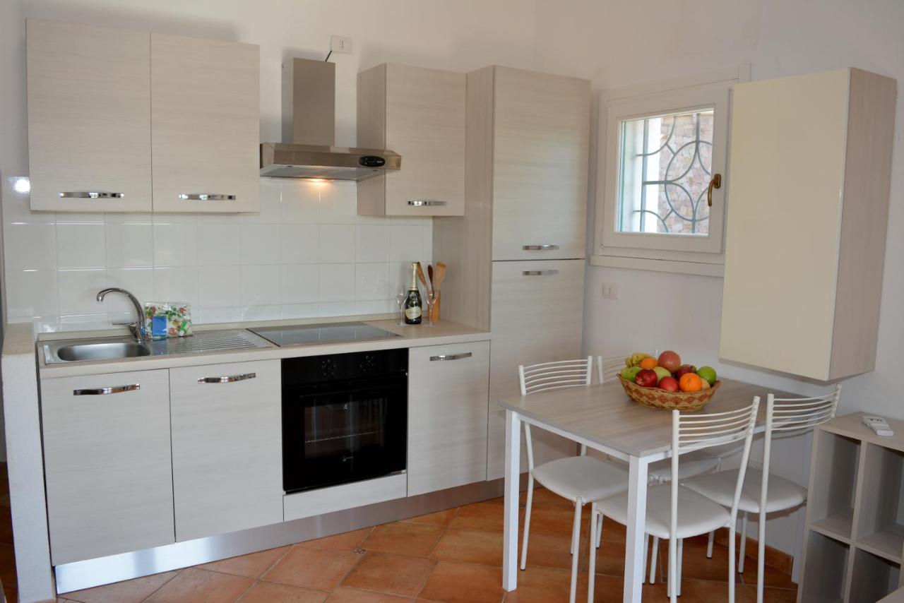 Appartamenti Residence Zodiaco Porto Pozzo Bagian luar foto