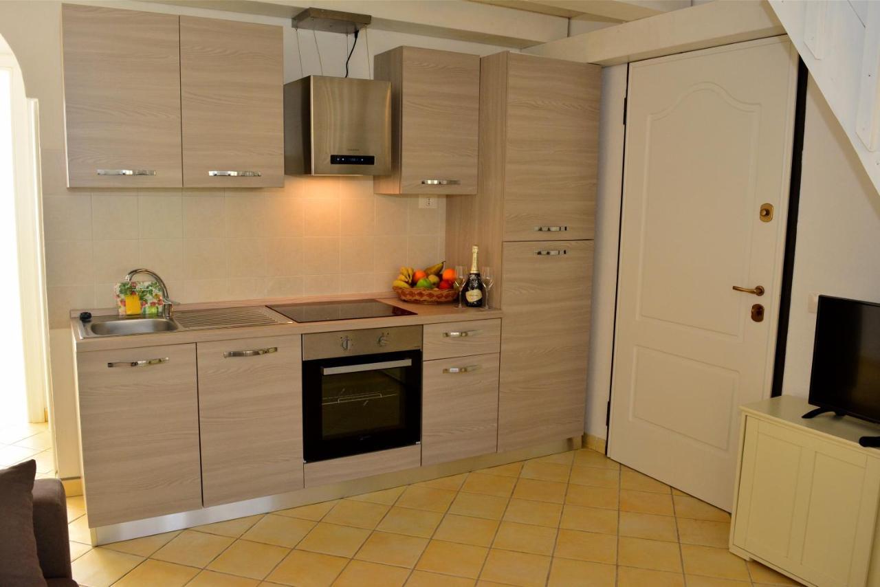 Appartamenti Residence Zodiaco Porto Pozzo Bagian luar foto